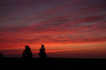 Obraz premium Rose sunset and colorful clouds