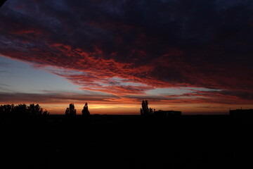 Fototapeta premium Orange sunset and clouds