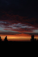 Fototapeta premium Orange sunset and clouds