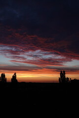 Fototapeta premium Orange sunset and clouds