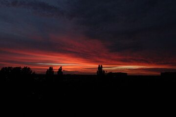 Fototapeta premium Orange sunset and clouds