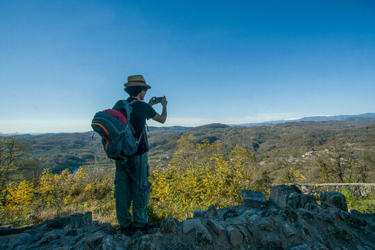 Traveler take video or photo over Georgian landscape