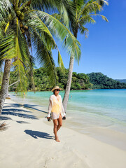 Strolling along the serene beaches of Koh Kood in Thailand under the sun