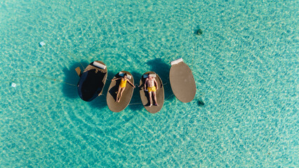 Relaxation on tranquil waters in Koh Kood Thailand with floating platforms and vibrant hues