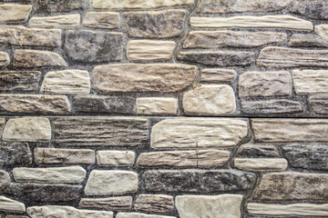 the texture of a stone wall on a building