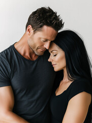 Obraz premium Portraits of mid 40s couple in love. Putting their head together.