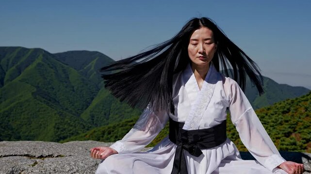 Digital Altered Korean Traditional Attire Photograph, Two-Faced Person on Rock Formation, Square Overlay, Natural Environment