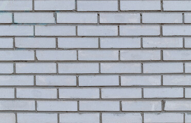 Obraz premium the wall of a modern building made of white silicate brick. texture for the background