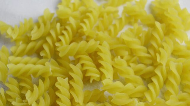Close - up of pasta.Classic dry macaroni.Italian Culture and Cuisine.Selective focus.