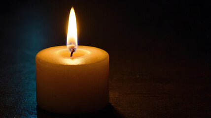 A single candle burning brightly in a dark room, its golden flame casting a warm and flickering glow on the surrounding shadows.