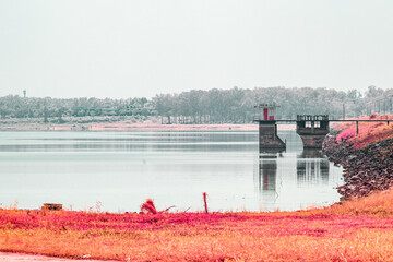 Infrared photography, a serene body of wate with a structure