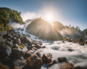 Morning at the Norwegian waterfall (L&aring;tefossen - Folgefonna - Hardangervidda - Norway)