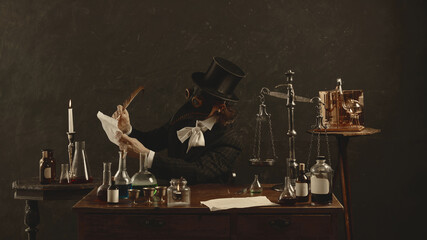 Plague doctor writes prescription, appointment to make ideal medicine for recovery in vintage laboratory against dark mystery background. Concept of medicine, science, pharmaceutical. Ad