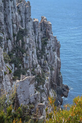 Spectacular cliffs of Cape Hauy Tasmania overlooking the ocean, a highlight of the rugged coastal...