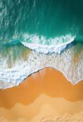Fototapeta premium an impressive tropical beach with a view of the ocean waves from above, bright sunlight, yellow sand and blue frothy waves, beautiful nature as a backdrop