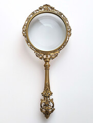 Ornate antique magnifying glass with brass handle and frame.