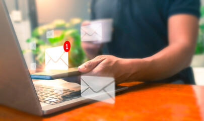 Man using smartphone with new email alert sign icon pop up, male using phone for check email for work or sending text SMS short message at cafe, Online communication concept