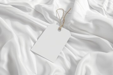 Blank tag on white silk fabric. (3)