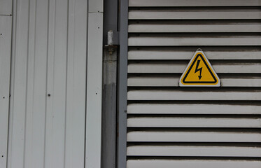 Power Sign On A Metal Gate Of Transformer Booth With Triangular High Power Sign 