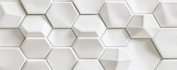Fototapeta premium A textured wall featuring white hexagonal tiles with varying depths.