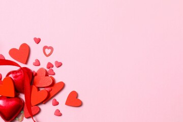 Beautiful red hearts on color background