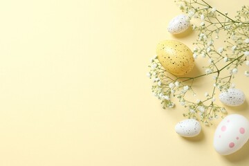 Easter decor concept. Top view photo of colorful eggs with flowers on color background