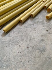electricity power pipe line in yellow on floor background