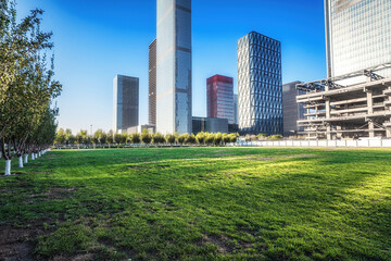 Fototapeta premium Urban Oasis: High-Rises Bordering Vibrant City Park