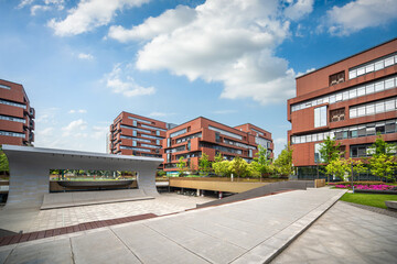 Modern Campus Buildings Under Blue Sky