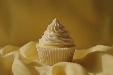 Delicious Vanilla Cupcake On Yellow Fabric