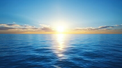 Obraz premium A sunrise reflecting on the blue ocean waters.