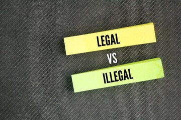 colored paper with the words legal vs illegal. when something is legal, it is allowed by law. Illegal, on the other hand, means that something is not allowed by law