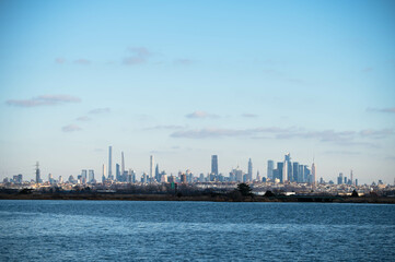 Manhattan skyscrapers skyline, cold winter day blue sky, travel destination background image,...