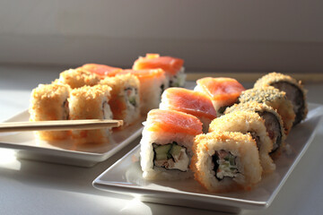 set of rolls and sushi with fish, breaded, rice, Japanese food, Japanese food delivery, bright...