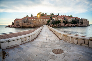 Sveti Stefan island near Budva at sunset light in winter time. Closed resort in Montenegro
