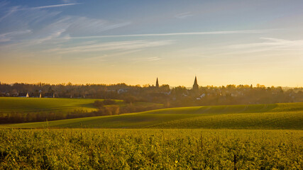 Obraz premium the two churches called Wiesnasen of Ratingen Homberg at golden evening sunlight