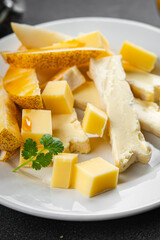 Cheese plate French cheeses fresh tasty food dish delicious gourmet food background on the table rustic food top view copy space