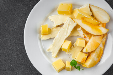 Cheese plate French cheeses fresh tasty food dish delicious gourmet food background on the table rustic food top view copy space
