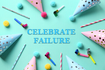 Celebrate failure. Party hats and blowers on turquoise background, flat lay