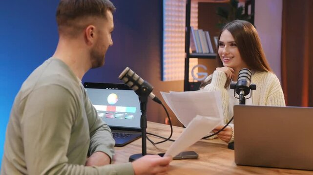 Discussion, talking in the studio. Radio hosts recording podcast.