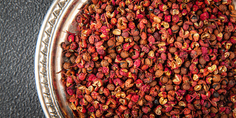 Sichuan pepper spice pepper peas fresh tasty food gourmet food background on the table rustic food...