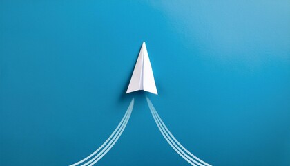 Fototapeta premium A paper plane flying powerfully from the starting point, symbolizing a new start and achieving goals