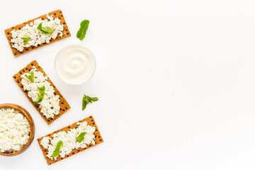 Healthy protein breakfast with crispy toasts and farm cottage cheese
