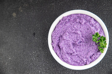 purple mashed potatoes fresh tasty food dish delicious gourmet food background on the table rustic food top view copy space keto and paleo diet Vegetarian and vegan food