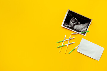 Ovulation and pregnancy tests with Ultrasound image of a baby. Pregnancy and conceiving a child...