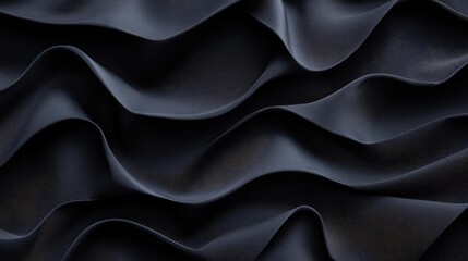 Fototapeta premium Velvet abstract background concept. Elegant black fabric texture featuring flowing waves and subtle shadows.