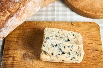 French cheese Fourme. Is a blue cheese from the Auvergne region and also from the Loire department, originally created in the area around Ambert (Puy-de-Dôme) with an AOC designation since May 9, 1972