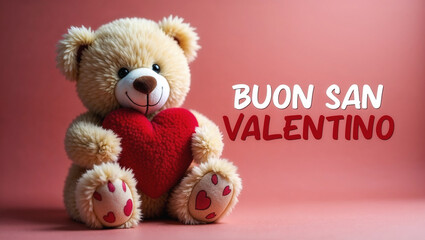 Cute teddy bear holding a red heart with the italian words for happy valentine's day on a pink background