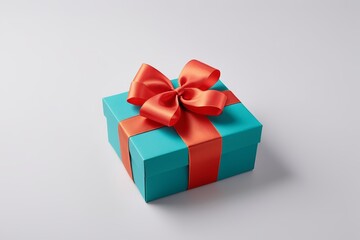 there is a blue box with a red ribbon and a bow