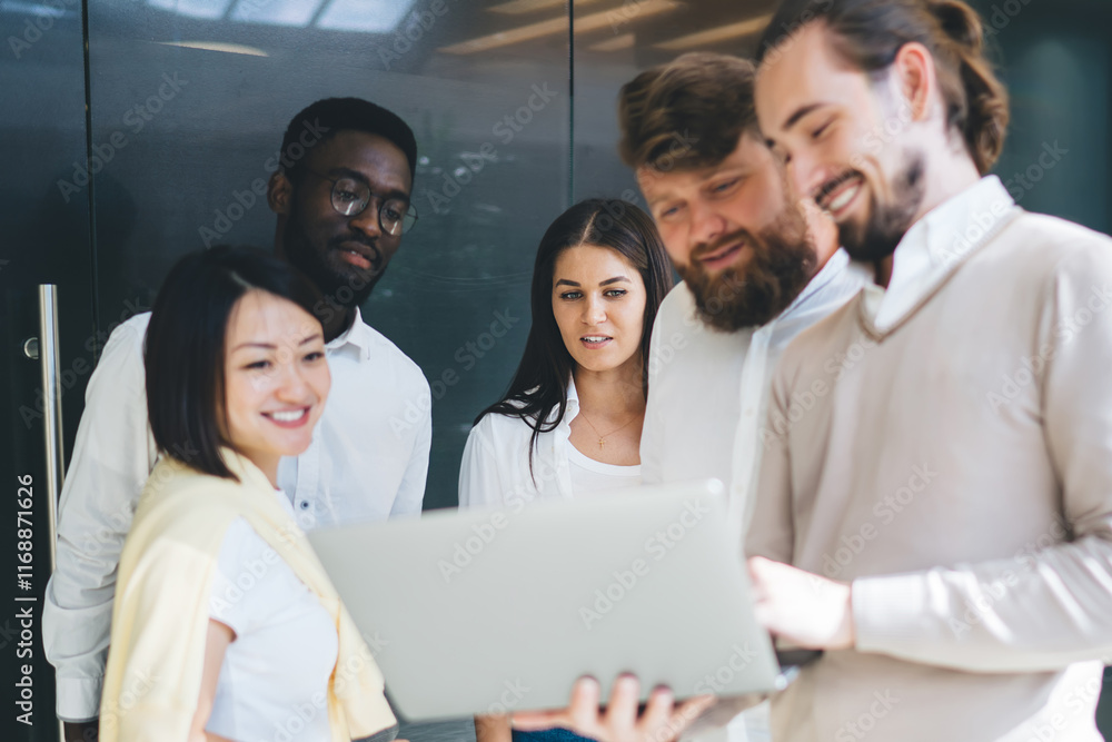 Poster team of smiling multiracial crew of skilled it professionals enjoying cooperation looking at online 